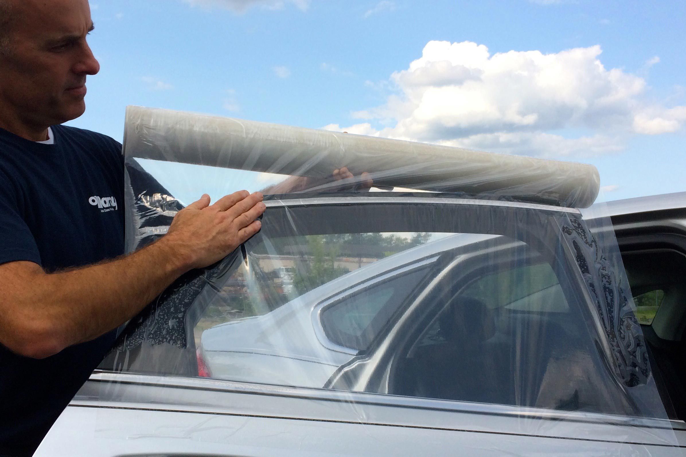 Marcy WindowGuard being applied to vehicle